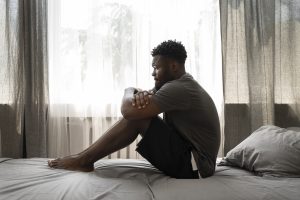 young-depressed-adult-home | Kenya Psychiatrist Association (KPA)